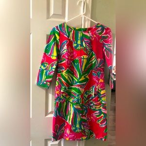 Vibrant Lilly Pulitzer dress with gold accents